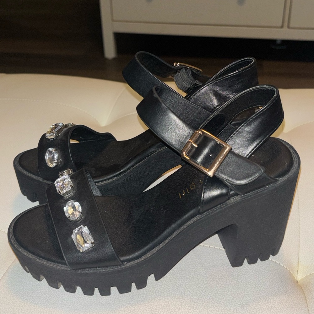Madden Girl black platforms. Size 6